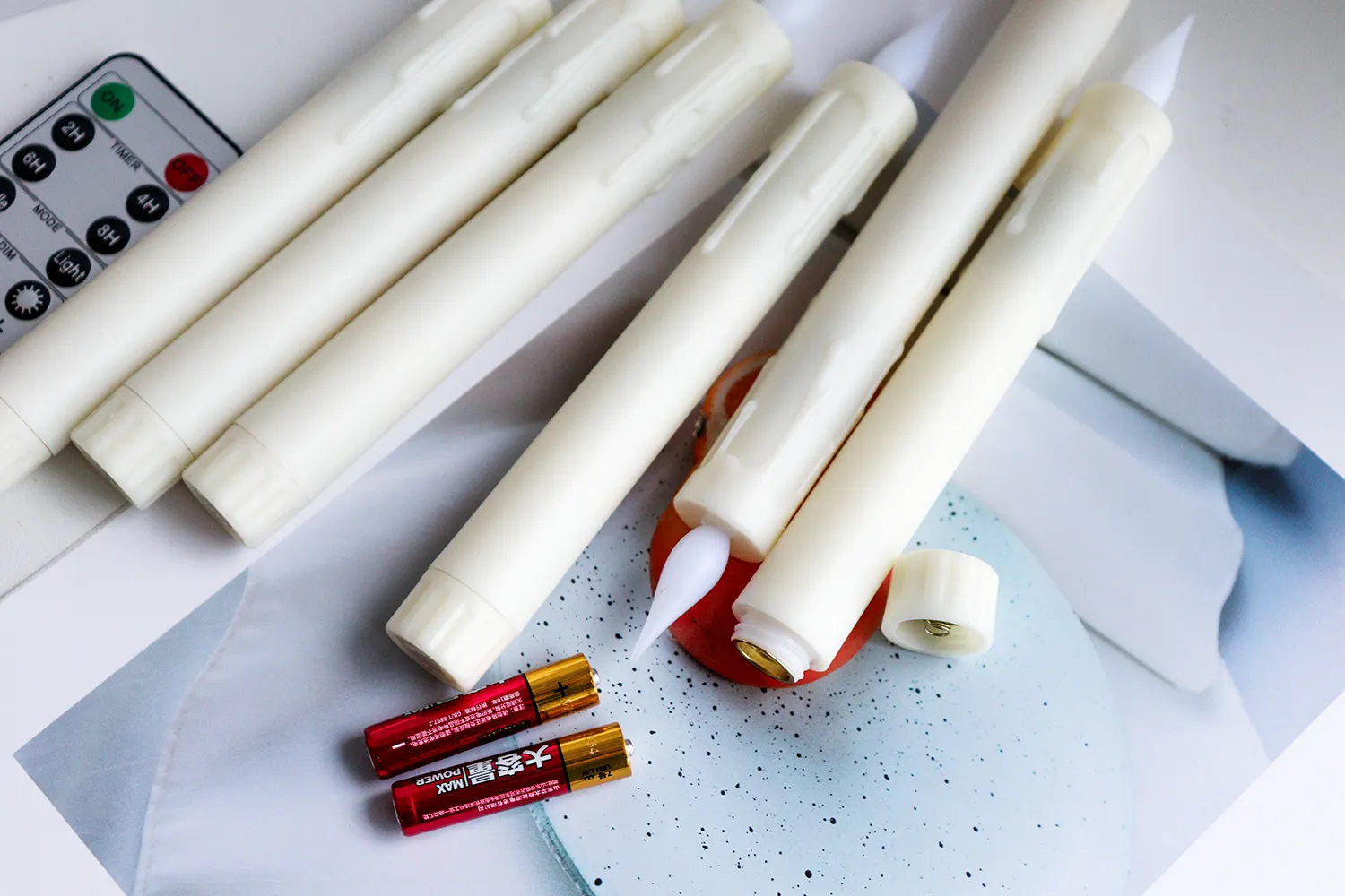 red flameless taper candles